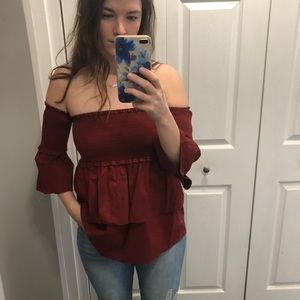 Rust colored, smocked, off the shoulder top